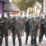 French mayor teargassed while protecting student protesters from police