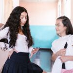Teenage girls urge ban on school uniforms in porn, question adults silence